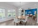 View of the dining room with natural lighting, table and chairs at 1214 Valley Dale Dr, Fuquay Varina, NC 27526