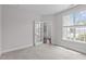 Bright office space with ample natural light and an open doorway at 1214 Valley Dale Dr, Fuquay Varina, NC 27526