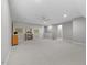 Spacious basement features a fireplace, neutral walls, and carpeted flooring at 122 Glenpark Pl, Cary, NC 27511