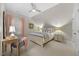 Cozy bedroom features carpet, ceiling fan, and bedside tables at 122 Glenpark Pl, Cary, NC 27511