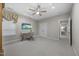 Neutral home office features carpeted floors, desk and ceiling fan at 122 Glenpark Pl, Cary, NC 27511