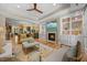 A beautiful living room features a fireplace, built-in shelving, and an open layout at 122 Glenpark Pl, Cary, NC 27511