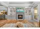 A beautiful living room features a fireplace, built-in shelving, and an open layout at 122 Glenpark Pl, Cary, NC 27511