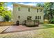 The spacious backyard offers a wood deck, patio and plenty of space for recreation at 12620 Waterlow Park Ln, Raleigh, NC 27614