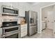 Modern kitchen featuring stainless steel appliances and plenty of counter space at 12620 Waterlow Park Ln, Raleigh, NC 27614