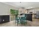 Eat-in kitchen with a breakfast nook and sliding glass door to the deck at 12620 Waterlow Park Ln, Raleigh, NC 27614