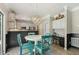 Kitchen features granite countertops, modern lighting, and a breakfast nook at 12620 Waterlow Park Ln, Raleigh, NC 27614