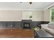 Hardwood floors and a cozy fireplace add character to this living room at 12620 Waterlow Park Ln, Raleigh, NC 27614