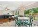 An open floorplan connects the breakfast nook to the fireplace in the living room at 12620 Waterlow Park Ln, Raleigh, NC 27614