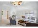 Inviting living room with ample seating, stylish decor, and great natural light at 13 Boxwood Dr, Durham, NC 27713