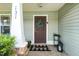 Front door featuring a Welcome mat and decorative wreath at 131 Abacos Ct, Clayton, NC 27520