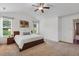 Well-lit main bedroom with carpet flooring and ensuite access, offering a serene retreat at 131 Abacos Ct, Clayton, NC 27520