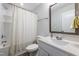 Traditional bathroom with a shower-tub combination, a stylish curtain, and a white vanity sink at 1363 Brown Velvet Ln, Apex, NC 27523