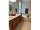 Modern bathroom with granite counters, soaking tub with tile surround and neutral color palette at 15 Cole Creek Way, Franklinton, NC 27525