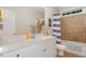 Clean bathroom featuring a vanity with a solid surface countertop and tiled shower at 15 Cole Creek Way, Franklinton, NC 27525