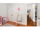 Bedroom featuring a closet, hardwood floors and a decorative flower on the wall at 15 Cole Creek Way, Franklinton, NC 27525