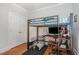 This bedroom features a lofted bed over a gaming setup and closet at 15 Cole Creek Way, Franklinton, NC 27525