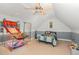 This bonus room features a basketball hoop and a bed at 15 Cole Creek Way, Franklinton, NC 27525