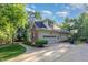 Spacious house with an attached garage and a paved driveway and basketball court at 15 Cole Creek Way, Franklinton, NC 27525