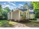 Side view of home showing siding, brick, and AC unit on grassy lawn at 15 Cole Creek Way, Franklinton, NC 27525