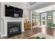 Living room with fireplace and modern shelving at 1633 Hillstar St, Fuquay Varina, NC 27526