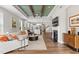 Spacious living room features hardwood floors, a ceiling fan, fireplace and open concept design at 1633 Hillstar St, Fuquay Varina, NC 27526
