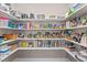 Walk-in pantry with ample shelving and storage space for all your kitchen needs at 1633 Hillstar St, Fuquay Varina, NC 27526