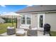 Cozy patio area with comfortable outdoor seating and a grill at 1633 Hillstar St, Fuquay Varina, NC 27526
