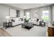 Cozy living room with stylish furnishings, decorative accents, and ample natural light at 197 Glen Hollow Dr, Raleigh, NC 27604