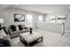 Bright living room with gray seating and stylish decor at 197 Glen Hollow Dr, Raleigh, NC 27604