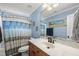 Bright bathroom with a spacious vanity area and a framed mirror is great for getting ready in the mornings at 2027 River Grove Ln, Knightdale, NC 27545
