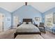 Spacious primary bedroom featuring a vaulted ceiling, plush carpeting, and natural light at 2027 River Grove Ln, Knightdale, NC 27545