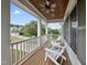 Relaxing covered front porch with rocking chairs and a view of the neighborhood at 2027 River Grove Ln, Knightdale, NC 27545