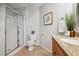 Bathroom featuring glass enclosed shower and wooden vanity at 205 Northfield Dr, Raleigh, NC 27609
