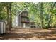 Exterior view of home showcasing wooden decks and backyard area at 205 Northfield Dr, Raleigh, NC 27609