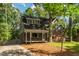 Charming two-story home with a welcoming front porch and well-maintained yard at 205 Northfield Dr, Raleigh, NC 27609