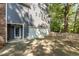 Spacious driveway leading to a two-car garage with white door at 205 Northfield Dr, Raleigh, NC 27609