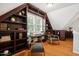 Bright home office with built-in wood shelving and a window that provides natural lighting at 205 Northfield Dr, Raleigh, NC 27609