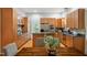 A kitchen with stainless steel appliances, granite countertops, and wood cabinets at 205 Northfield Dr, Raleigh, NC 27609