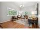 Bright living room featuring hardwood floors and a large bay window at 205 Northfield Dr, Raleigh, NC 27609