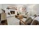 Cozy living room featuring a fireplace and comfortable seating at 205 Northfield Dr, Raleigh, NC 27609