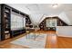 Bright office space featuring hardwood floors, custom built in bookshelves, and natural light at 205 Northfield Dr, Raleigh, NC 27609