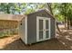 Backyard shed offers additional storage and compliments the home's backyard at 205 Northfield Dr, Raleigh, NC 27609