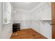 Well-organized walk-in closet with shelving, creating a clutter-free and functional storage space at 205 Northfield Dr, Raleigh, NC 27609