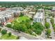Aerial view of apartment building next to a green park in a lively neighborhood at 214 Hunt St # 701, Durham, NC 27701