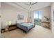 Serene bedroom with large window offering city views and plush carpeting at 214 Hunt St # 701, Durham, NC 27701
