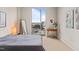 Bright bedroom featuring a large window with city views and carpet flooring at 214 Hunt St # 701, Durham, NC 27701