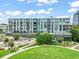 Modern apartment building with balconies and landscaped grounds in a park-like setting at 214 Hunt St # 701, Durham, NC 27701