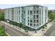 Contemporary apartment building with stylish balconies and street-level retail space at 214 Hunt St # 701, Durham, NC 27701