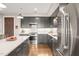 Well-equipped kitchen with stainless steel appliances, sleek cabinetry, and a bright, clean aesthetic at 214 Hunt St # 701, Durham, NC 27701